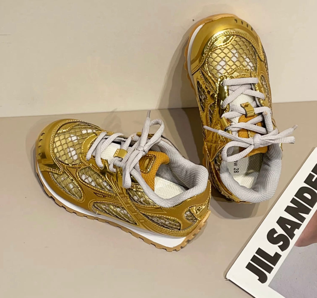 Children shoes gold